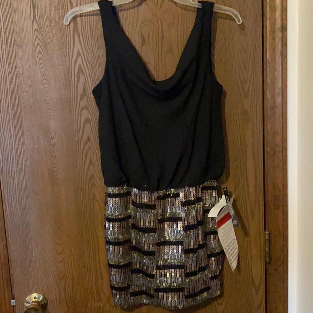 As You Wish size large. Only worn to try on.